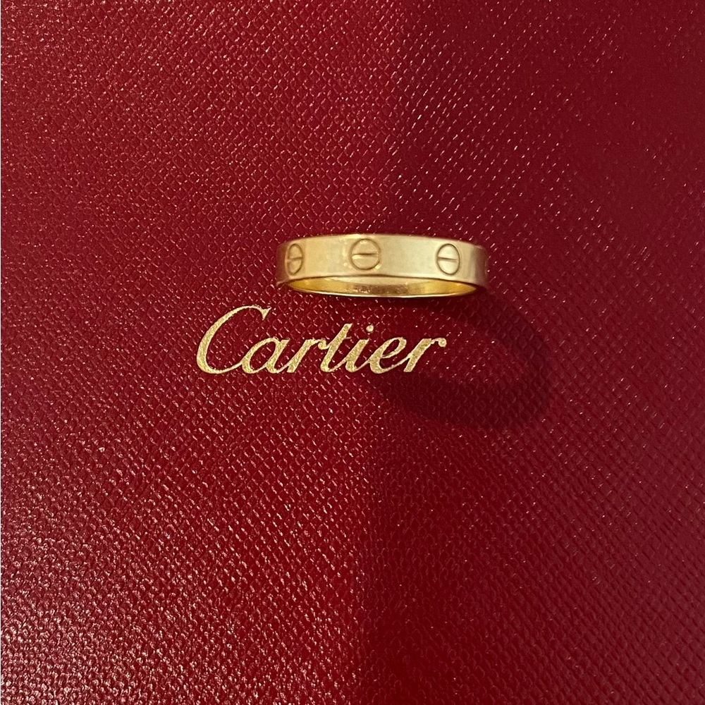 Thin yellow 18k Cartier love ring